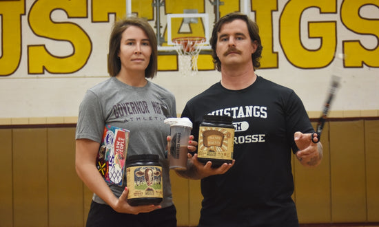 Two Teachers holding Earth Fed Muscle products